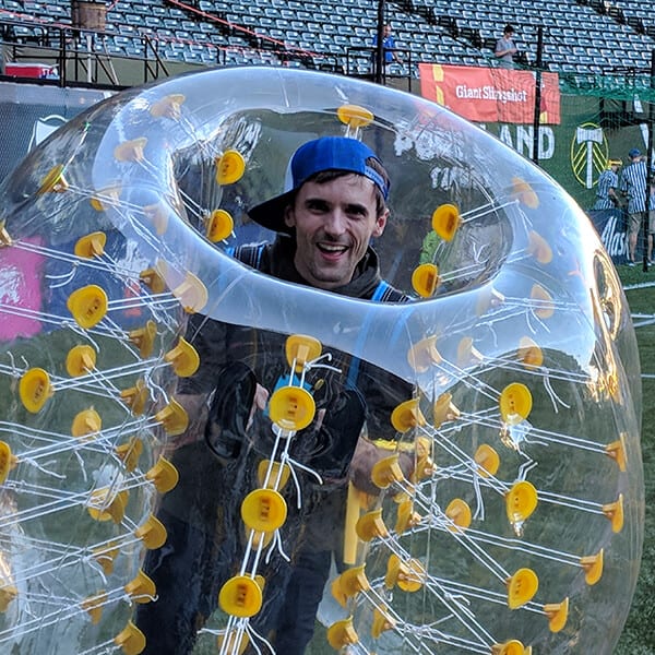 michael in a plastic bouncing bubble